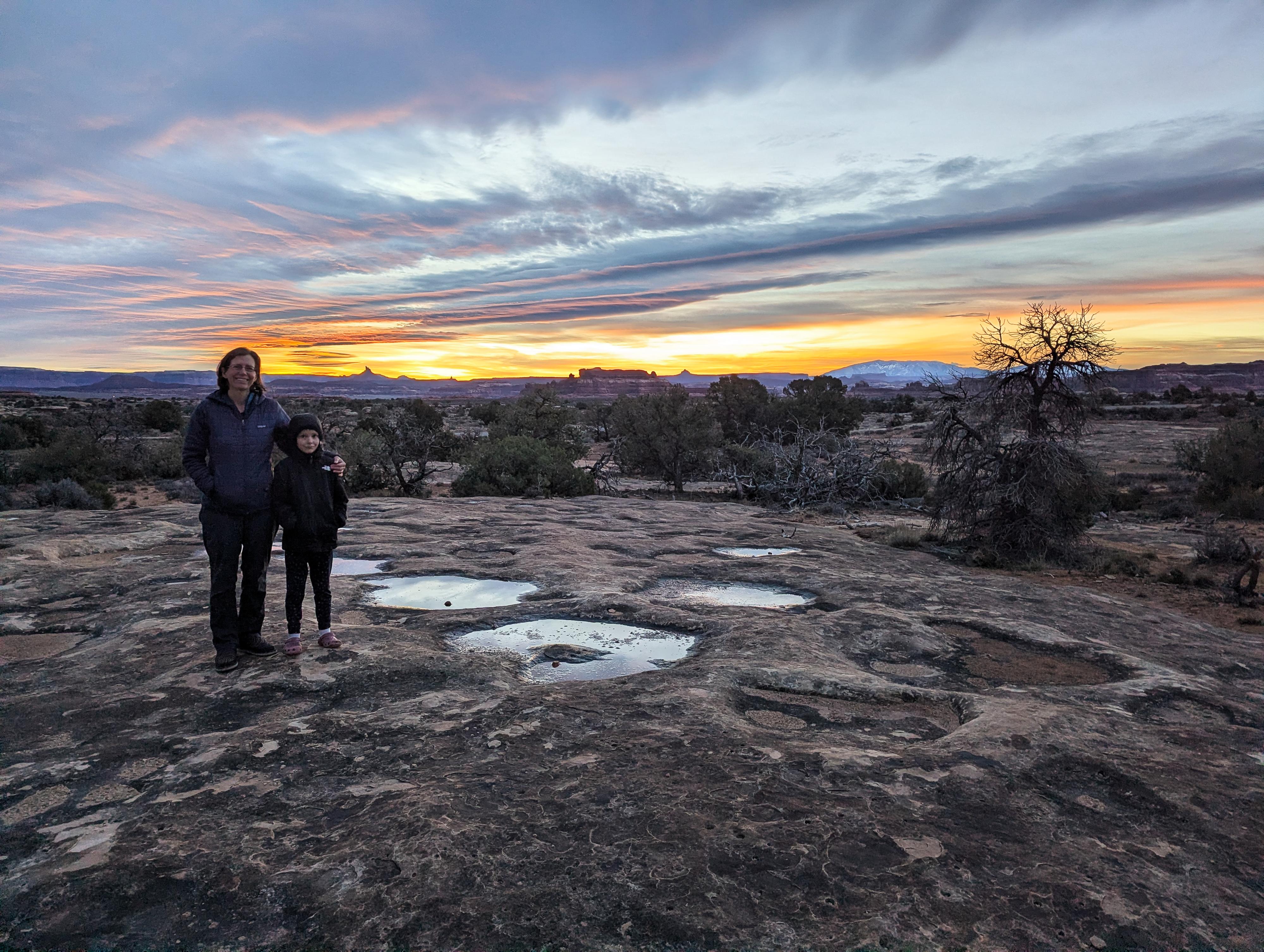 The family enjoying the sunrise. 