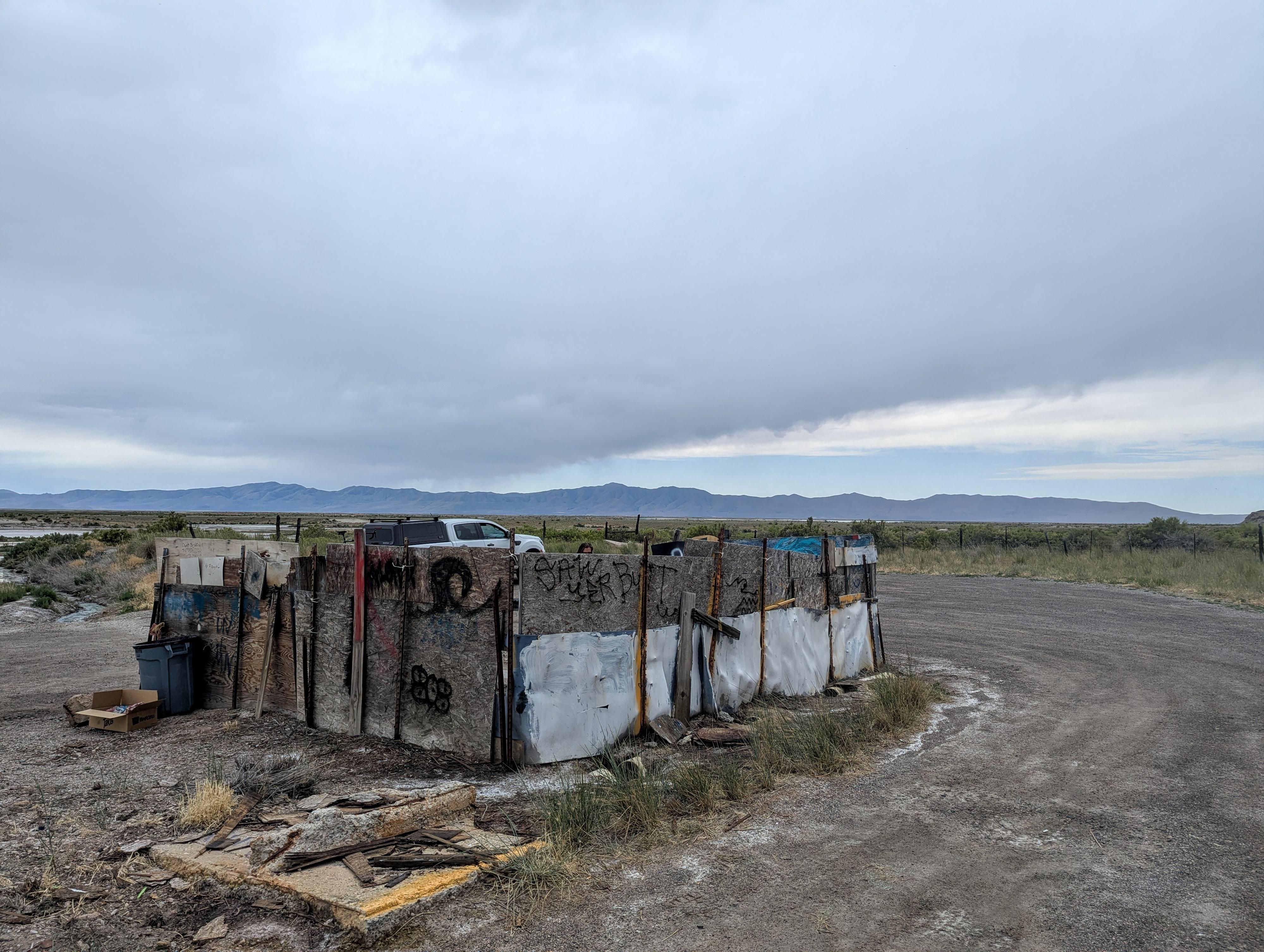 Looks like a shanty or even garbage from the road. 