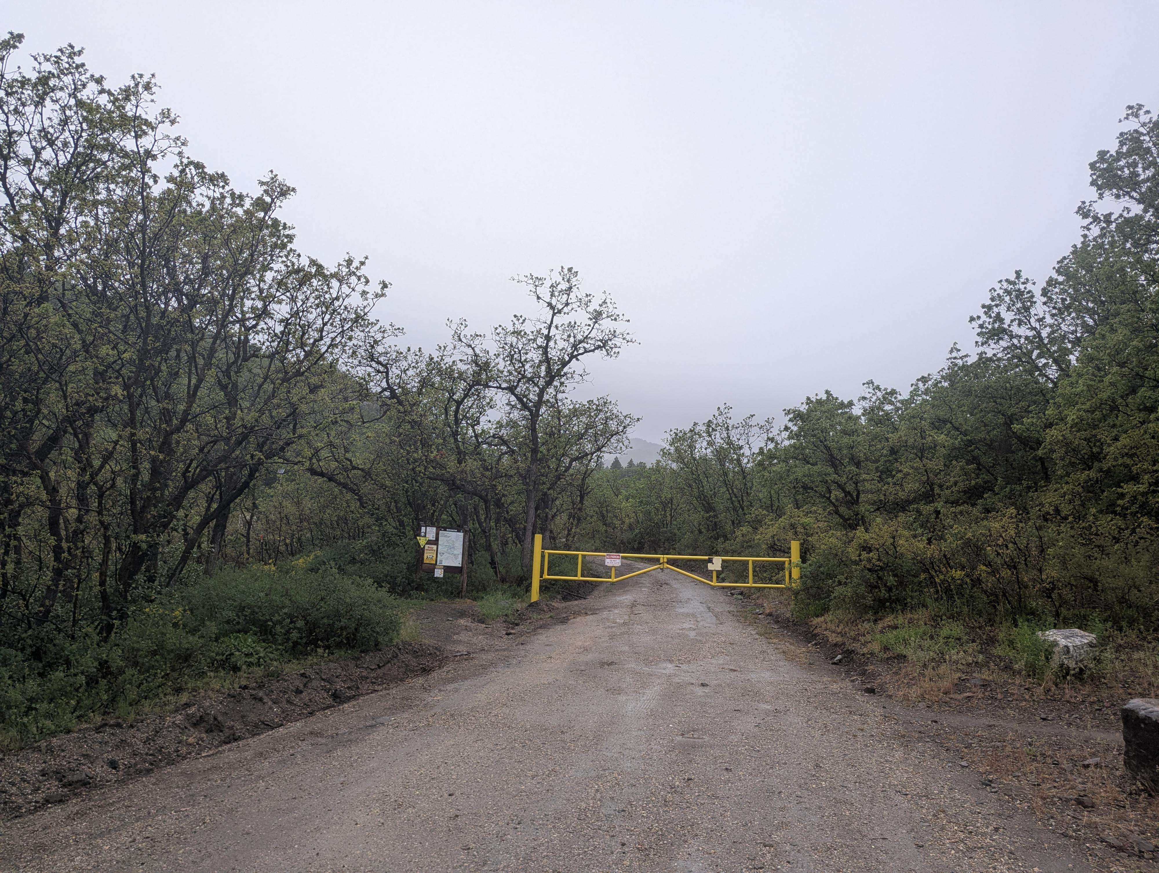 The trailhead, start on the road behind the gate. 