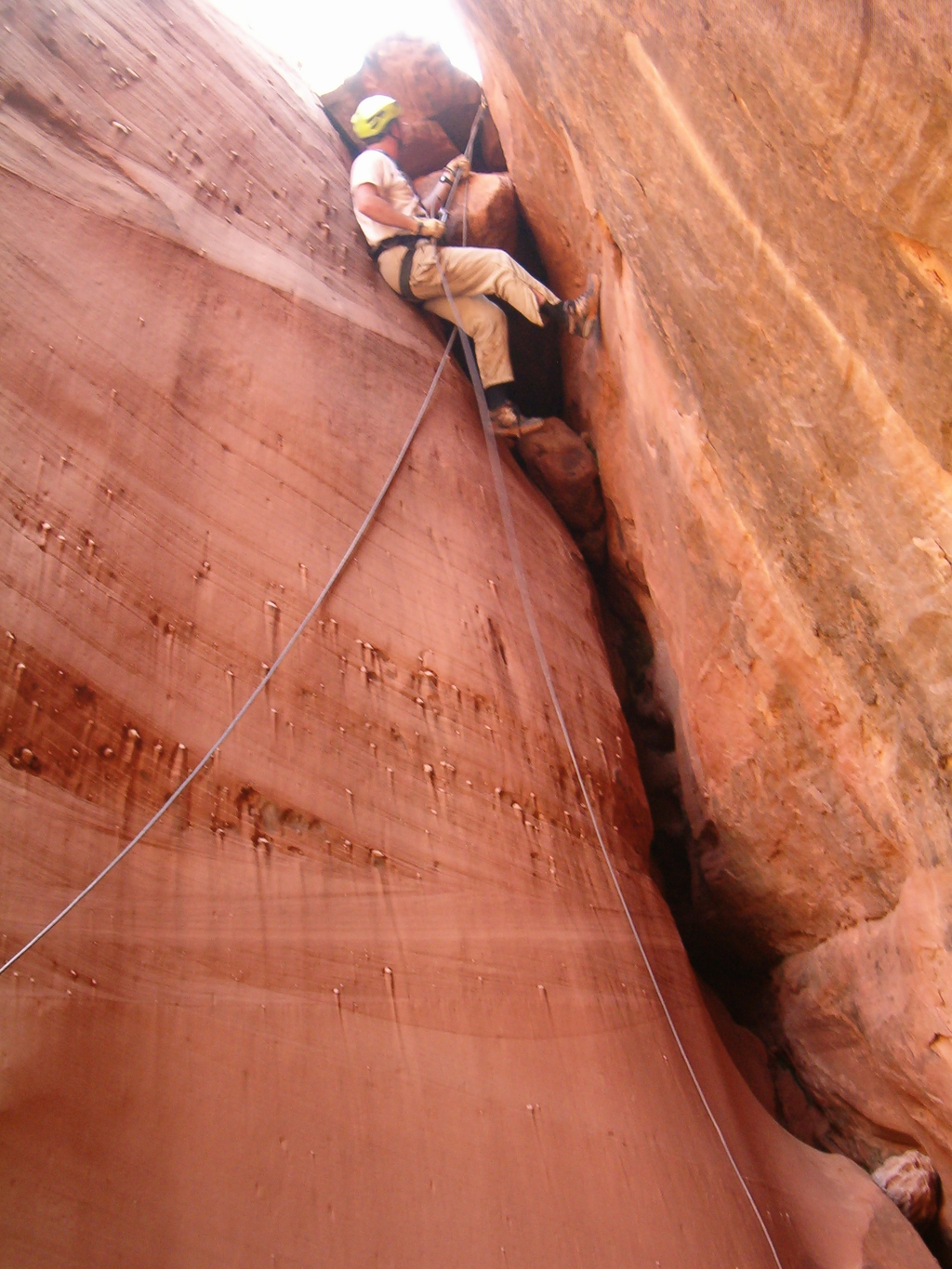 Tom Jones rappelling the first drop - Adobe Swale - Poison Spring